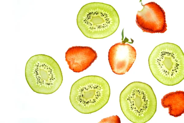Sliced Kiwi Sliced Strawberry Lies White Bright Background Illuminated Concept — Stock Photo, Image