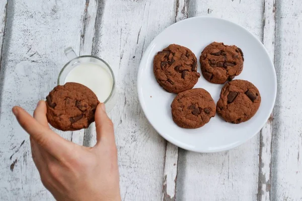 eat cookies and drink milk - close up from above