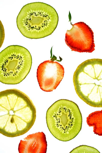 Différents Fruits Tranchés Comme Orange Les Fraises Kiwi Reposent Sur — Photo