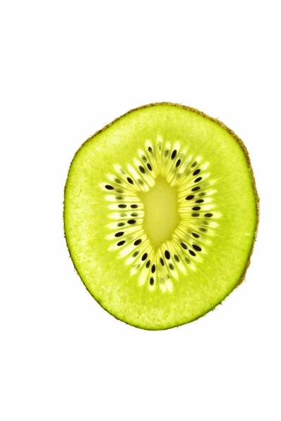 Sliced Kiwi Lies Light Background Thin Kiwi Slices Illuminated — Stock Photo, Image