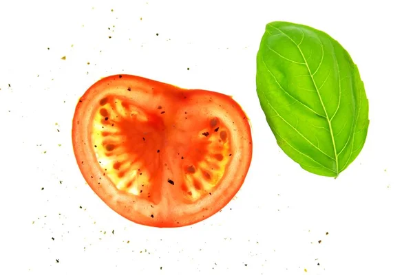 Sliced Tomato Pieces Lay Basil Leaves White Bright Background Illuminated — Stock Photo, Image