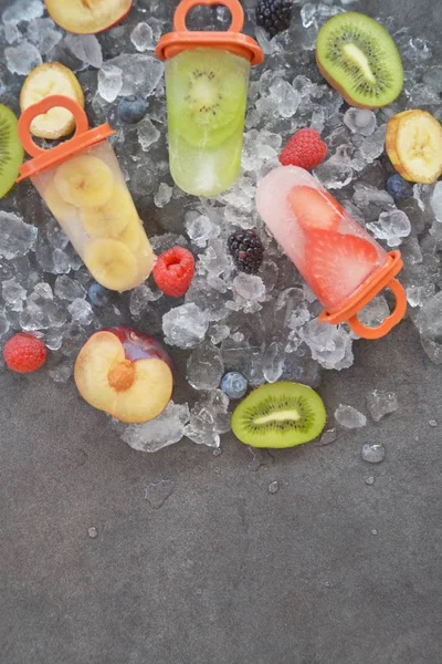fruit ice with pieces of fruits on ice cubes