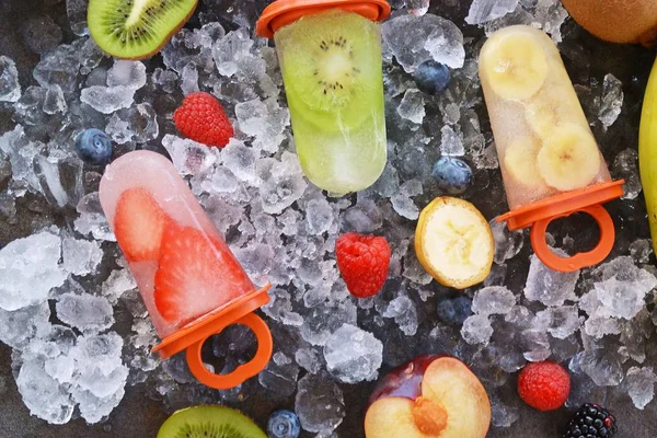 fruit ice with pieces of fruits on ice cubes