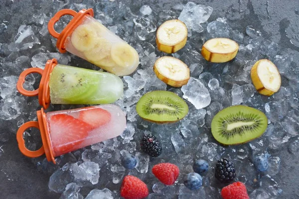 fruit ice with pieces of fruits on ice cubes