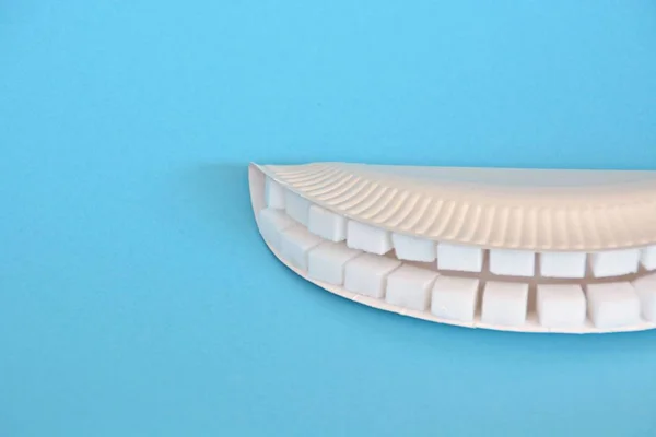Δόντια Από Κύβους Ζάχαρης Ένα Γεμάτο Φόντο — Φωτογραφία Αρχείου