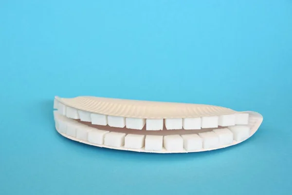 Teeth Out Sugar Cubes Colurful Background — Stock Photo, Image
