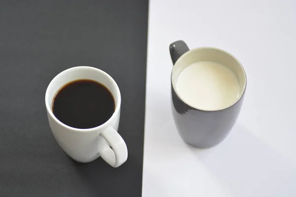 Two Cups Front Half Black Half White Background One Cup — Stock Photo, Image