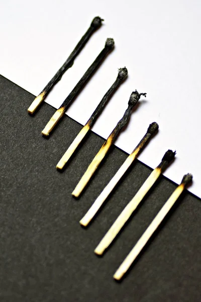 Concept Contrasts Matches Have Burned Different Extents Lie White Black — Stock Photo, Image