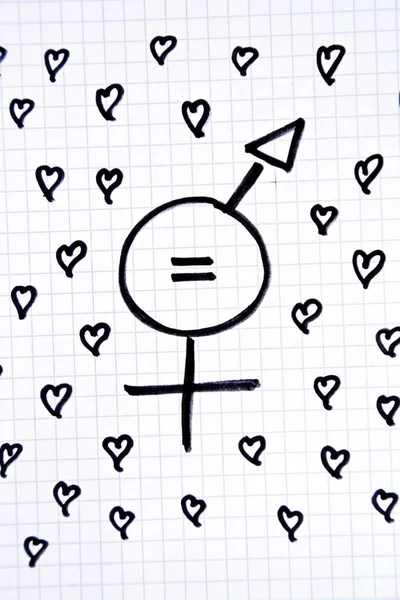 A sign for the equality of man and woman consisting of the respective gender signs and a same with partly painted hearts on a drawn sheet drawn - equality man and woman symbolically represented