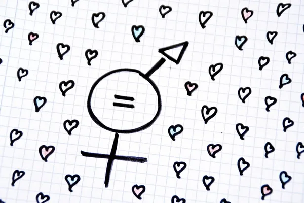 A sign for the equality of man and woman consisting of the respective gender signs and a same with partly painted hearts on a drawn sheet drawn - equality man and woman symbolically represented