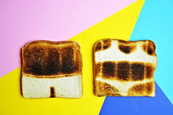 Three Toasts Lie Colorful Background Toasted Whole Surface Show Contours — Stock Photo, Image