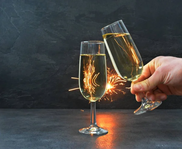 Two Filled Champagne Flutes Stand Dark Front Sparkler Which Illuminates — Stock Photo, Image