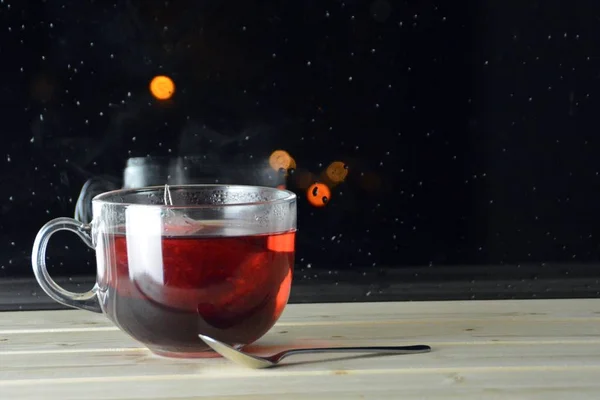 Large Glass Fruit Tea Standing Wooden Windowsill Night Front Rain — Stock Photo, Image