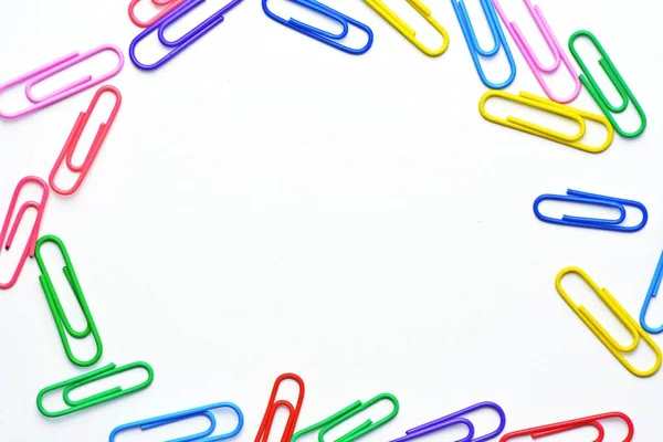 Various Colored Paper Clips Lie White Surface Background Consisting White — Stock Photo, Image