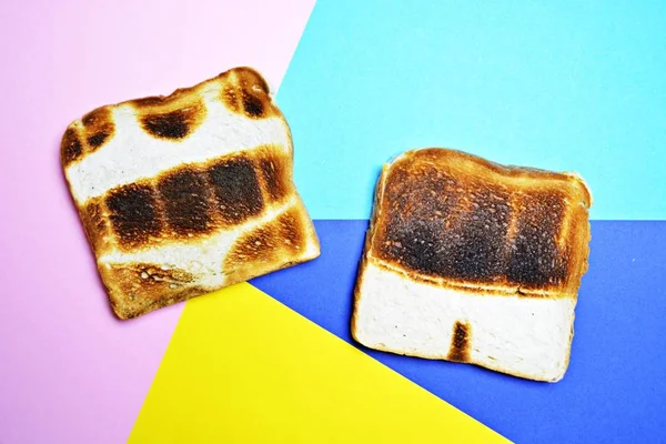 Three Toasts Lie Colorful Background Toasted Whole Surface Show Contours — Stock Photo, Image