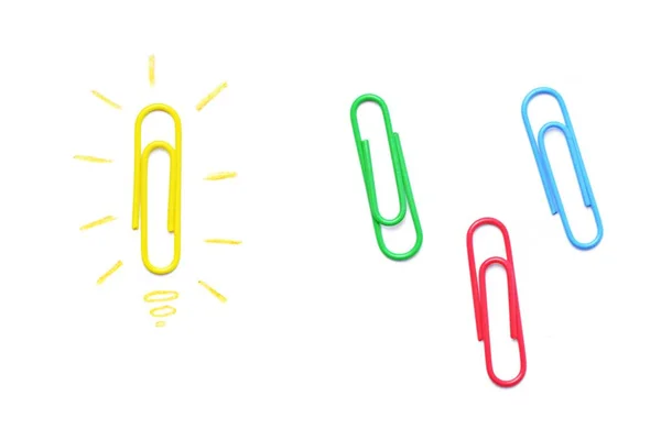 Een Gele Paperclip Als Een Symbool Van Een Gloeilamp Die — Stockfoto