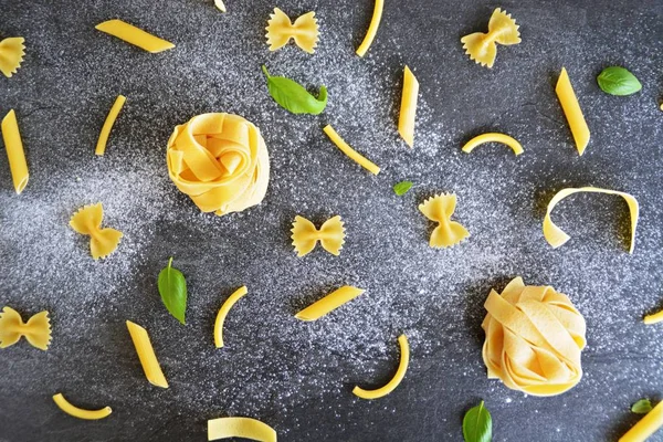 Word Noodle Written Flour Polluted Area Various Types Pasta Penne — Stock Photo, Image