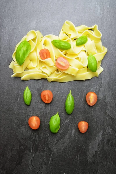 Cloud Freshly Cooked Tagliatelle Lies Dark Marble Background Basil Leaves — Stock Photo, Image