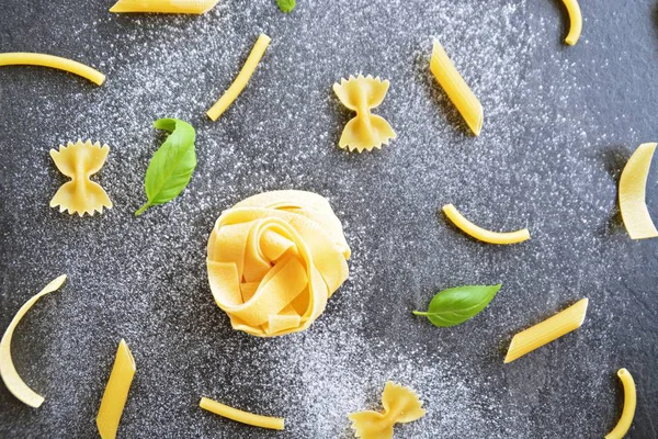 Word Noodle Written Flour Polluted Area Various Types Pasta Penne — Stock Photo, Image