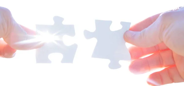 Person Holds Two Puzzle Pieces His Hand Fit Together Background — Stock Photo, Image