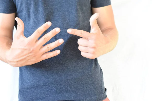 Young Man Shows Horn Fingers Gesture Has Different Meanings Different — Stock Photo, Image