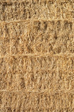 Stacked straw bales as a background