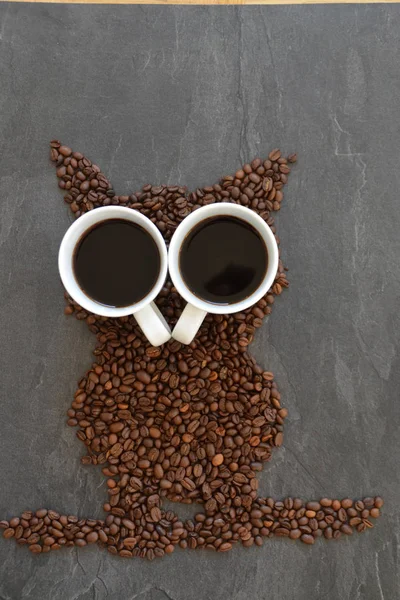 Coffee Beans Black Background Form Silhouette Owl Two Cups Coffee — Stock Photo, Image
