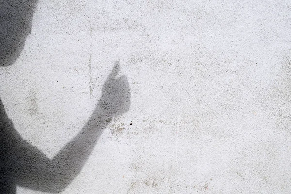 Sombra Homem Gesticulando Polegar Parede Branca — Fotografia de Stock