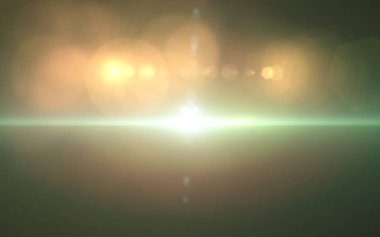 Siyah arkaplan üzerinde soyut lens ışığı parlıyor. Güneş siyah arkaplanda parlıyor.