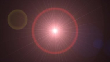 Lens siyah arka plan üzerinde ışık parlama. fotoğrafların üzerine bindirme veya ekran filtresi eklemek kolaydır. Uzayda güneş parlaması