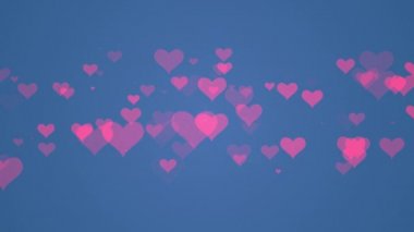 Mavi arka plan video ile kalp parçacık sanatı. Sevgililer günü için mini kalp