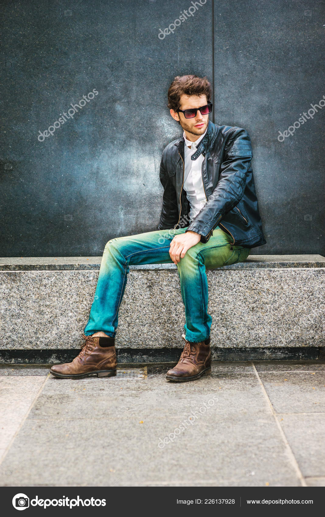 Brown Jacket Jeans Stock by ©xcai Photo Dressing Blue Shoes 226137928 Boot Wearing Black Leather