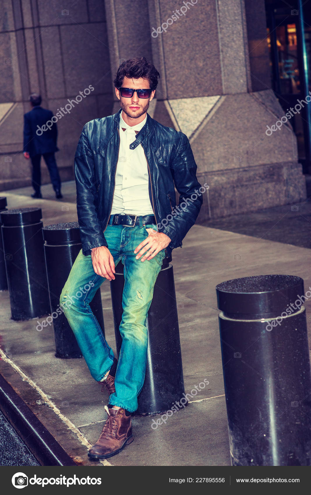 black jacket blue jeans