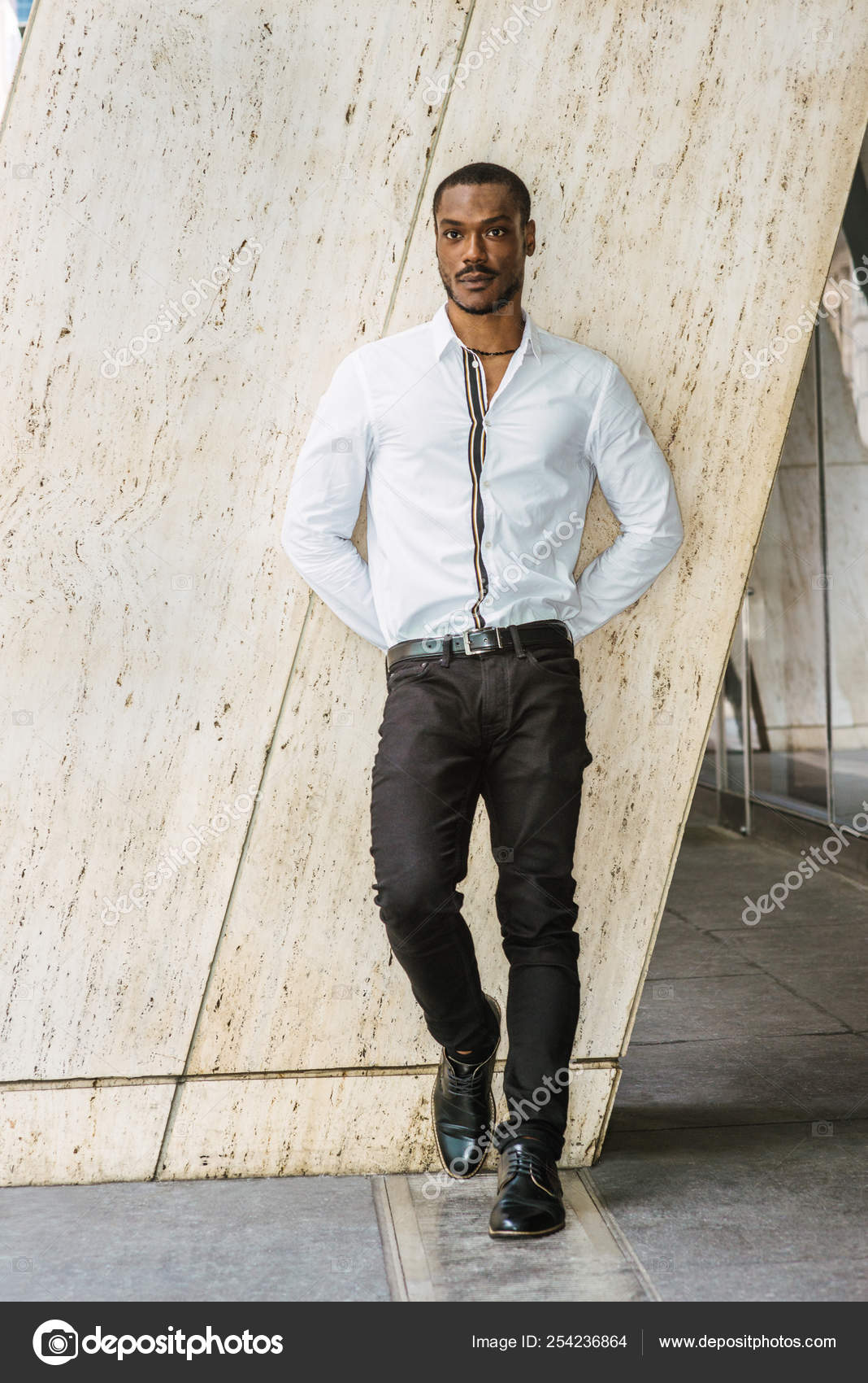 white long sleeve shirt with black pants
