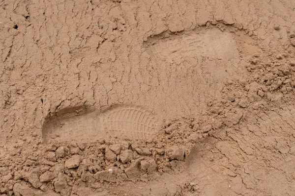 texture of sand. footprints in the sand.