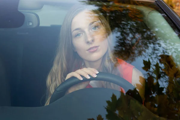 Young Beautiful Woman Long Hair Sits Wheel Car Dreamingly Watched — Stock Photo, Image