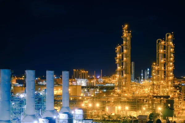 Glitter lighting of distillation tower and smoke stacks of power plant at night, Manufacturing of petrochemical plant, Factory of Olefins plant