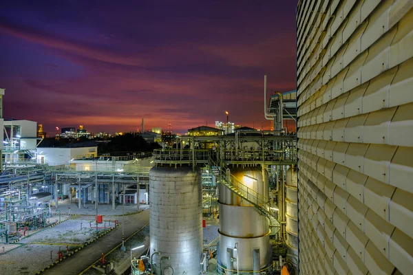 Chemical tanks in petrochemical industry plant or Reactor for chemical reaction in factory with sky sunset background