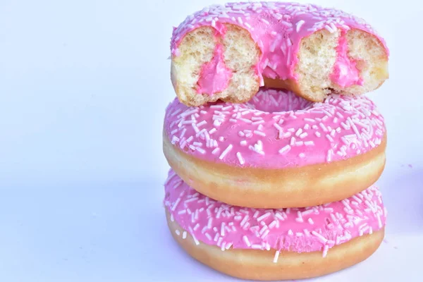 doughnuts with pink glaze close up