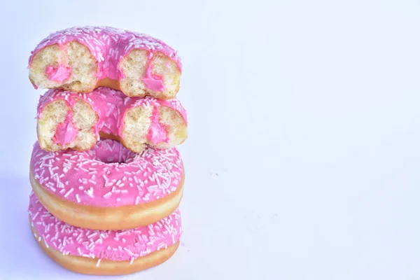 doughnuts with pink glaze close up