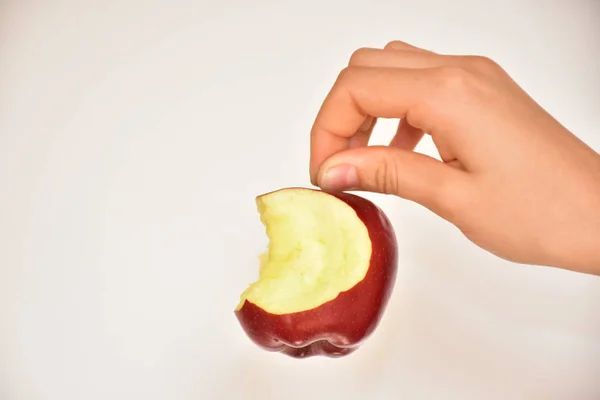 hand and apple close up