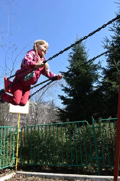 Little Blonde Girl Riding Swing — Stock Photo, Image