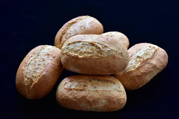 bread on a black background