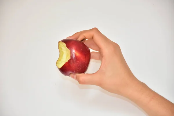 hand and apple close up