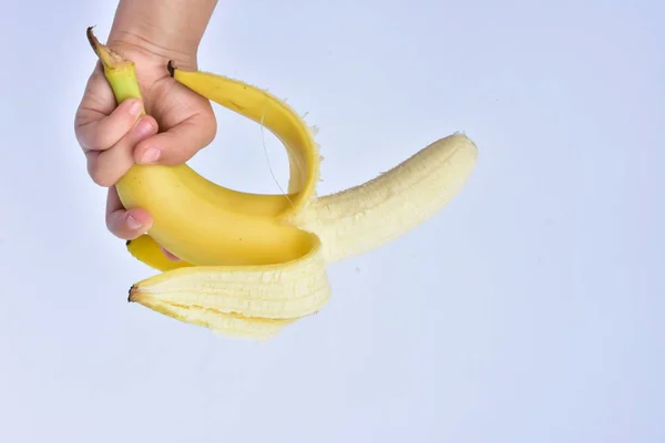 Banane Der Hand Aus Nächster Nähe — Stockfoto