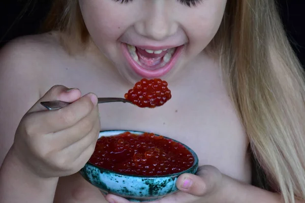 Child Eats Red Caviar Fish — Stock Photo, Image