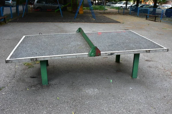 playground with small ping pong table