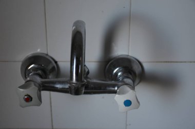 Close up shot of old metal faucet