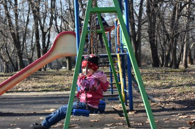 beautiful little girl on playground 