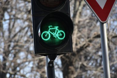 bicycle green sign on traffic light